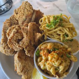Red snapper and shrimp combo with mac and cheese and garlic noodles. Red snapper and shrimp combo with mac and cheese and garlic noodles.
