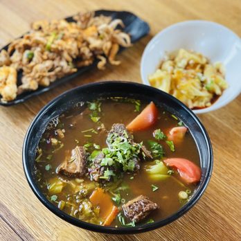 Noodle Man - Salt & Pepper Squid; Pork Dumplings in Chili Oil; Tomato and Beef Brisket Soup - Chinese Near Me - Chesapeake, Virginia Noodle Man - Salt & Pepper Squid; Pork Dumplings in Chili Oil; Tomato and Beef Brisket Soup - Chinese Near Me - Chesapeake, Virginia