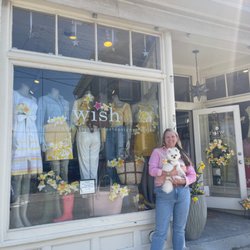 Wish Newport - Shop owner, Kate, with shop dog, Margo, for Newport Daffy Days.