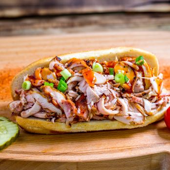 Rollin Smoke BBQ - Pulled Chicken Sandwich - Juicy smoked chicken piled high on a bun with BBQ sauce. Tender & flavorful. - Barbeque Near Me - Avondale, Arizona Rollin Smoke BBQ - Pulled Chicken Sandwich - Juicy smoked chicken piled high on a bun with BBQ sauce. Tender & flavorful. - Barbeque Near Me - Avondale, Arizona