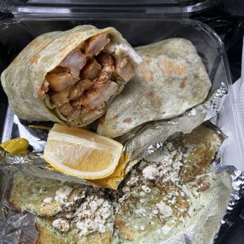Manny's Olive & Vine - Garlic Shrimp Burrito Potatoes slices in Cilantro sauce w/ feta - Greek Near Me - Paramount, California