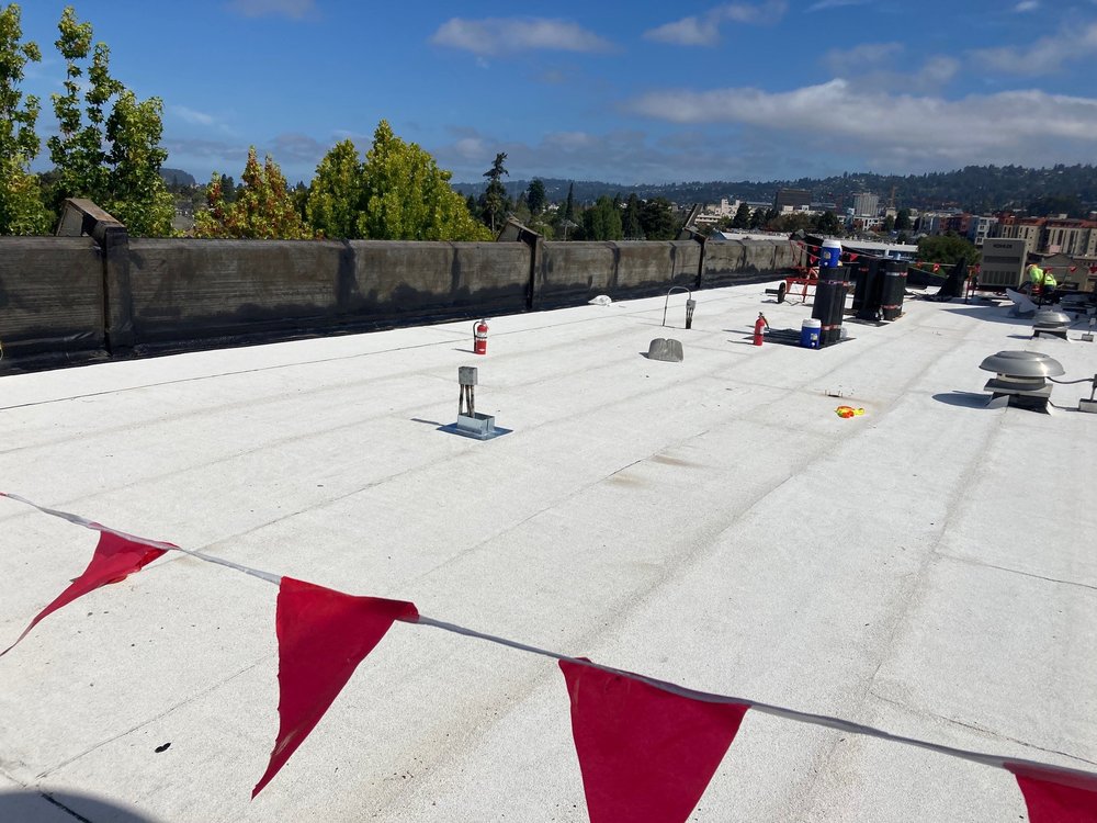 Slide of A-One Roof Management