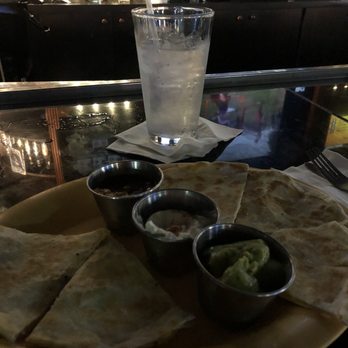 Lonestar Grill & Sports Cafe - Chicken Quesadilla w/Salsa, Sour Cream, & Guacamole - Sports Bars Near Me - Richardson, Texas Lonestar Grill & Sports Cafe - Chicken Quesadilla w/Salsa, Sour Cream, & Guacamole - Sports Bars Near Me - Richardson, Texas