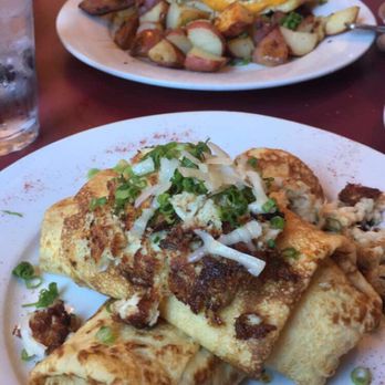 Cafe Conti - Crab crepe (bottom) - Breakfast & Brunch Near Me - New Orleans, Louisiana Cafe Conti - Crab crepe (bottom) - Breakfast & Brunch Near Me - New Orleans, Louisiana