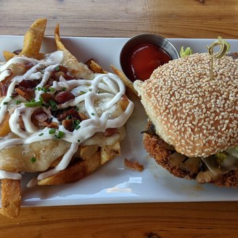 Jealous Monk - Chicken schnitzel with loaded fries. - Beer Gardens Near Me - Mystic, Connecticut