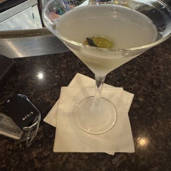 Charleston's - Dirty Vodka martini with Blue Cheese stuffed olives - American Near Me - Fort Worth, Texas