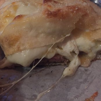 Sliced - Sausage calzone, cut - Pizza Near Me - Commerce, Georgia