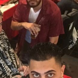 Inside A&J unprofessional establishment.Barber above and owner under; unprofessional Very! Inside A&J unprofessional establishment.Barber above and owner under; unprofessional Very!