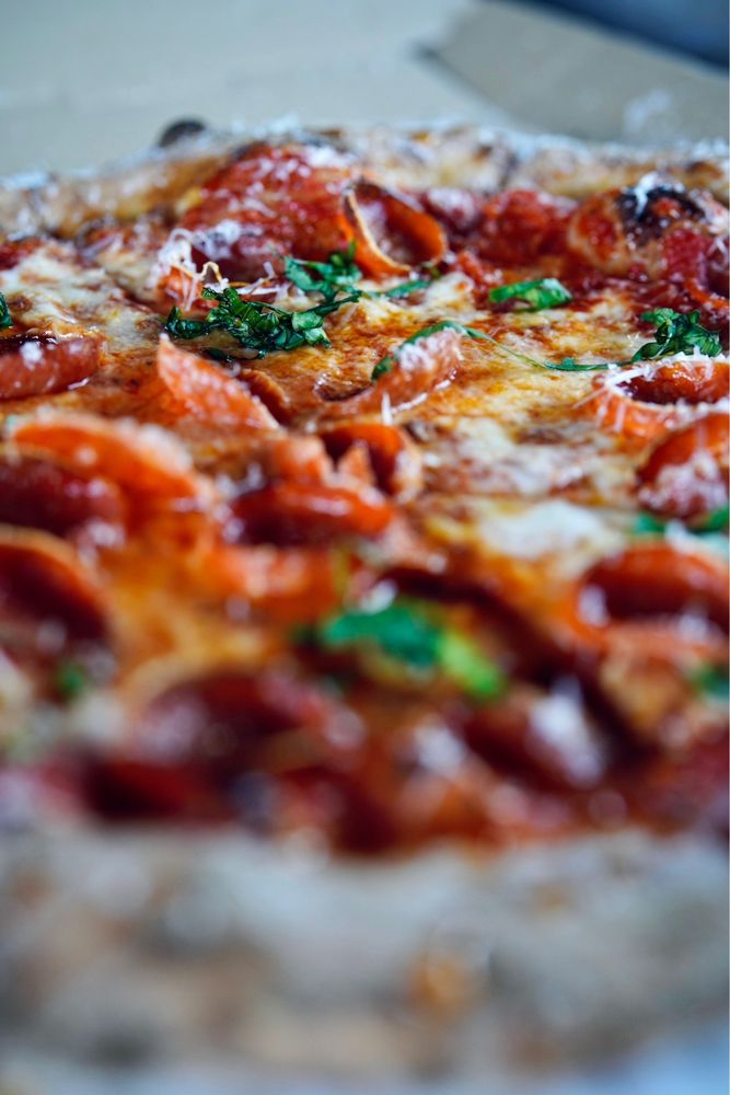 Sunday Pizza Company Logo