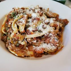 Paesano's Pasta House - I built my own- fettuccine bolognese plus hot sausage, artichoke and capers