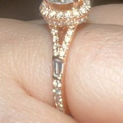 Asymmetrical gold added to cover baguette diamond