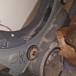Keyanna's Maintenance & Appliance Service - Replacing rear drum rollers & cleaning service of the dryer!