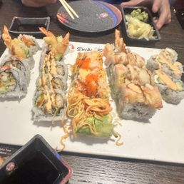 Shrimp tempura, Mexican roll , volcano roll , monster roll , last one is cowboy roll Shrimp tempura, Mexican roll , volcano roll , monster roll , last one is cowboy roll
