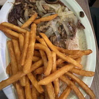 La Bodega - Ribeye steak with onions and mushrooms & bear battered fries - Steakhouses Near Me - Yuma, Arizona La Bodega - Ribeye steak with onions and mushrooms & bear battered fries - Steakhouses Near Me - Yuma, Arizona