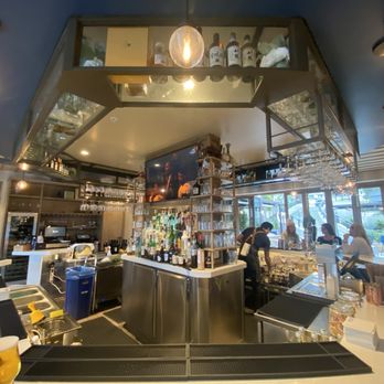 Local - Check out the bar area where customers can sit and even watch the game on TV. - New American Near Me - Santa Barbara, California Local - Check out the bar area where customers can sit and even watch the game on TV. - New American Near Me - Santa Barbara, California