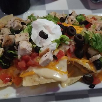 Johnny Huston's - Small JH chicken nacho (appetizer). - Seafood Near Me - Navarre, Florida Johnny Huston's - Small JH chicken nacho (appetizer). - Seafood Near Me - Navarre, Florida