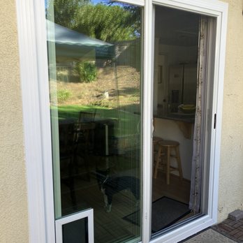 Elor Energy - Back Sliding Patio Door w/Doggie Opening - Roofing Near Me - Carlsbad, California Elor Energy - Back Sliding Patio Door w/Doggie Opening - Roofing Near Me - Carlsbad, California