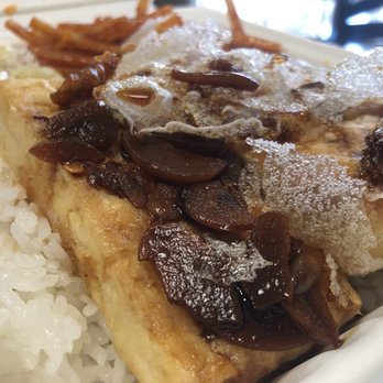 Gina's Kapolei - Fried Tofu with garlic sauce.  Guessing that's a fried spring roll wrapper on top as garnish.  Tofu was really good, and I don't eat tofu. - Barbeque Near Me - Kapolei, Hawaii