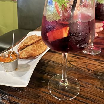 Truffle Bistro - Short rib empanadas with a smoked paprika aioli and sangria - Italian Near Me - Orange, California Truffle Bistro - Short rib empanadas with a smoked paprika aioli and sangria - Italian Near Me - Orange, California