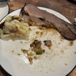 Brisket Dinner (half eaten) 5 pieces of brisket, mashed potatoes and green beans. Delish Brisket Dinner (half eaten) 5 pieces of brisket, mashed potatoes and green beans. Delish