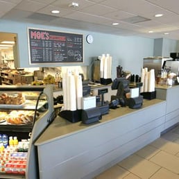 a counter with a variety of food items a counter with a variety of food items