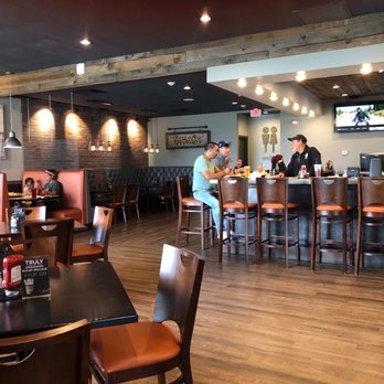 Max's - people sitting at tables in a restaurant - Chicken Wings Near Me - North Dartmouth, Massachusetts
