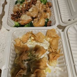 Crab Rangoon (starving so that's why rangoon looks sparse) and Honey Walnut Prawns  Portions great, tastes great