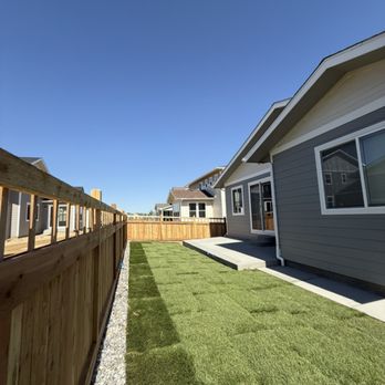 Fox Landscaping - Concrete patio and walk way. Sod install with sprinkler system and decorative rock. - Landscaping Near Me - Brighton, Colorado