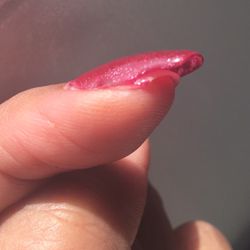 Soul Sisters Salon and Spa - The nail extension isn't completely attached to my nail.
