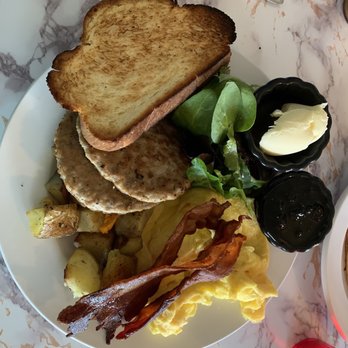 Beechwood Cafe - Au sable breakfast-2 eggs, pancake, Ebel's sausage, roasted potatoes with garlic, challah toast with a salad garnish and a berry compote. - Cafes Near Me - Roscommon, Michigan