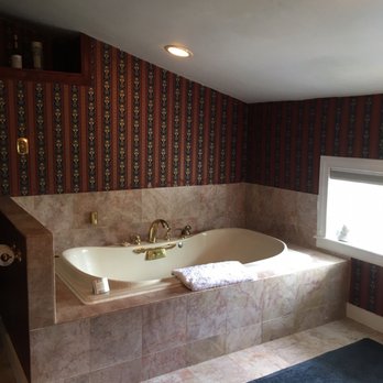 Antrim 1844 - The tub with handheld shower head. No shower in this room, only this tub. - Hotels Near Me - Taneytown, Maryland Antrim 1844 - The tub with handheld shower head. No shower in this room, only this tub. - Hotels Near Me - Taneytown, Maryland