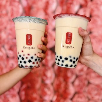Gong Cha - two people holding cups of bubble tea - Bubble Tea Near Me - Cranston, Rhode Island Gong Cha - two people holding cups of bubble tea - Bubble Tea Near Me - Cranston, Rhode Island