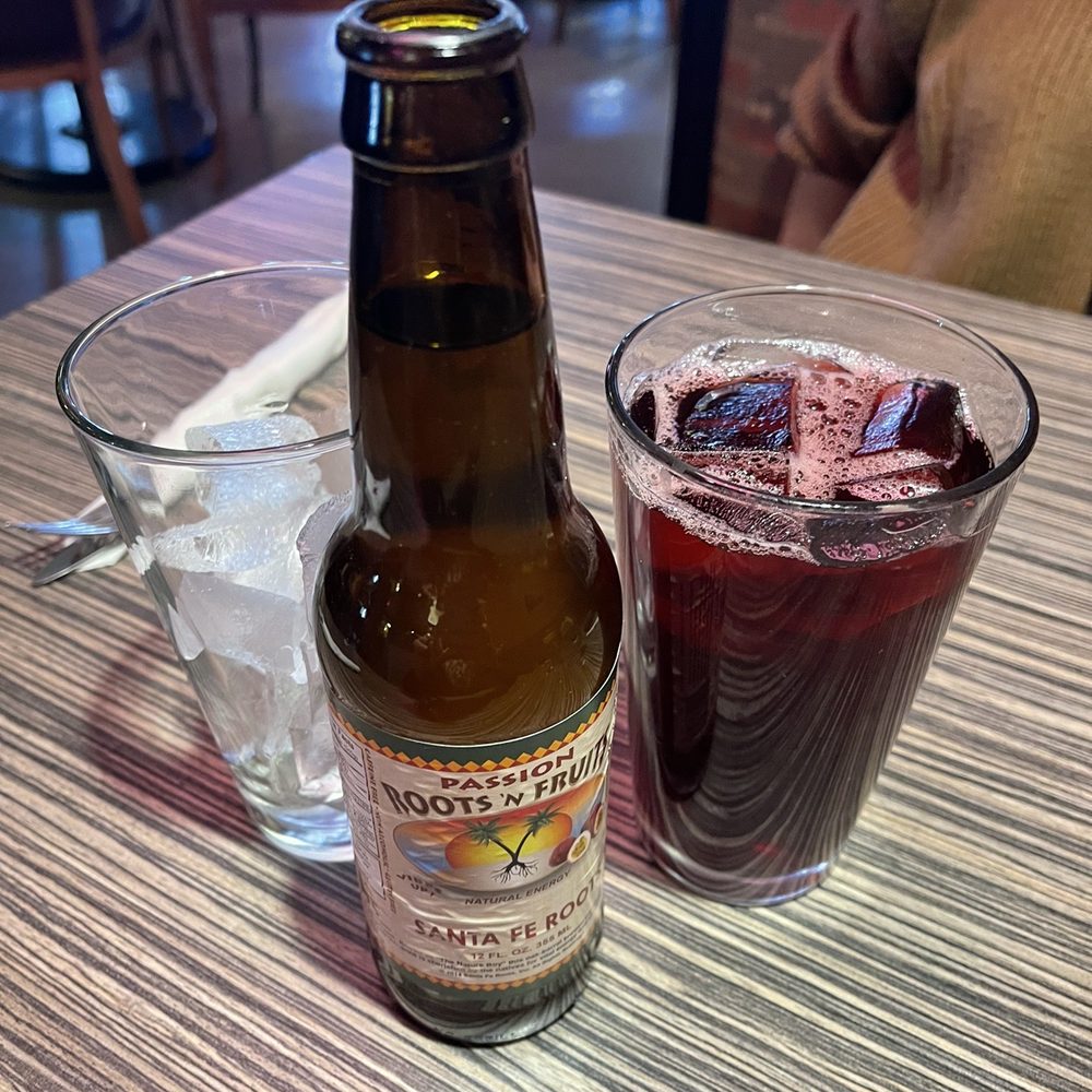 Jambo Cafe - Passion fruit roots drink and House-Made Jamaican Hibiscus Iced Tea - Caribbean Near Me - Santa Fe, New Mexico Jambo Cafe - Passion fruit roots drink and House-Made Jamaican Hibiscus Iced Tea - Caribbean Near Me - Santa Fe, New Mexico