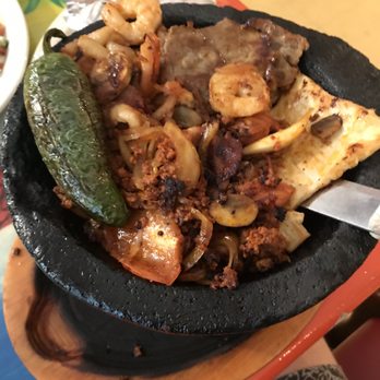 Sazon - a bowl of food on a table - Mexican Near Me - Williamson, West Virginia