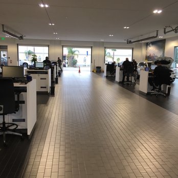 Long Beach BMW - Advisor desks are outside, beside the isle where you pull in your car. - Auto Repair Near Me - Long Beach, California Long Beach BMW - Advisor desks are outside, beside the isle where you pull in your car. - Auto Repair Near Me - Long Beach, California