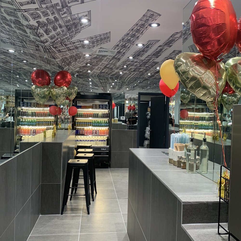 Matto - the interior of a restaurant with balloons - Coffee & Tea Near Me - New York, New York Matto - the interior of a restaurant with balloons - Coffee & Tea Near Me - New York, New York