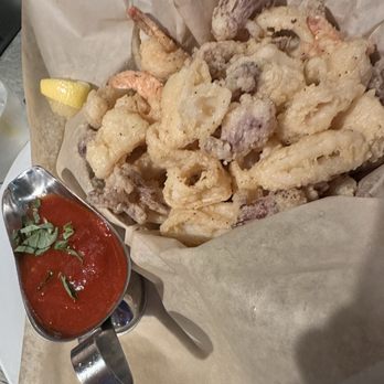 Bottega Italia - FRITTURA DI PARANZA (Bottega Italia's Calamari) Calamari, rock shrimp and mediterranean fish deep fried and served with a wedge of lemon - Pizza Near Me - Temecula, California Bottega Italia - FRITTURA DI PARANZA (Bottega Italia's Calamari) Calamari, rock shrimp and mediterranean fish deep fried and served with a wedge of lemon - Pizza Near Me - Temecula, California