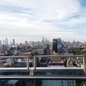 Rooftop 93 - Outside looking In - Lounges Near Me - New York, New York