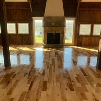 CT Affordable Flooring - a living room with hardwood floors - Flooring Near Me CT Affordable Flooring - a living room with hardwood floors - Flooring Near Me