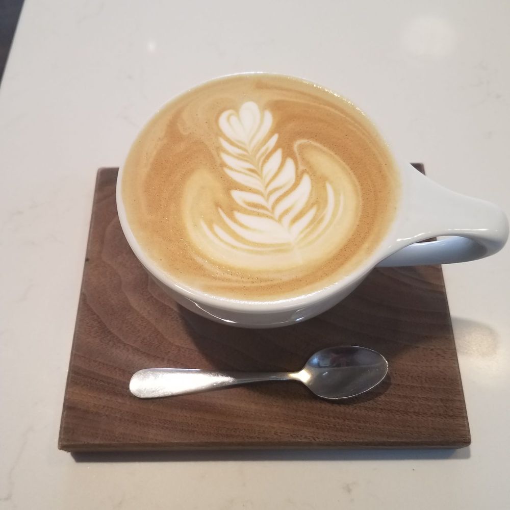 Revolution Roasters - Butterscotch latte filled to the brim... pre wobbly table - Coffee & Tea Near Me - Oceanside, California Revolution Roasters - Butterscotch latte filled to the brim... pre wobbly table - Coffee & Tea Near Me - Oceanside, California