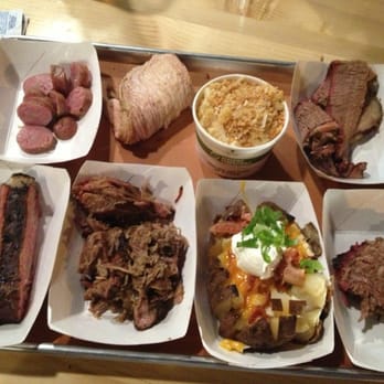 Morgan's Brooklyn Barbecue - Clockwise from top left, pork sausage, turkey, mac & cheese, lean & fatty briskets, stuffed potato, pulled pork, pork ribs - Barbeque Near Me - Brooklyn, New York Morgan's Brooklyn Barbecue - Clockwise from top left, pork sausage, turkey, mac & cheese, lean & fatty briskets, stuffed potato, pulled pork, pork ribs - Barbeque Near Me - Brooklyn, New York