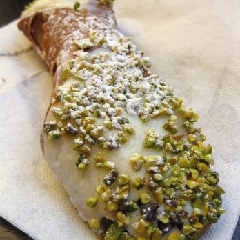 Ciuri Ciuri - Cannoli filled with ricotta and topped with pistachio. Ok but not great b/c fried ahead of time. Recommend you skip the cannoli - Desserts Near Me - Rome, RM Ciuri Ciuri - Cannoli filled with ricotta and topped with pistachio. Ok but not great b/c fried ahead of time. Recommend you skip the cannoli - Desserts Near Me - Rome, RM