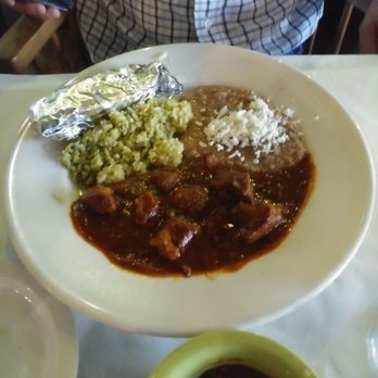 Chili Verde - Spicy pork in red sauce - Mexican Near Me - Denver, Colorado Chili Verde - Spicy pork in red sauce - Mexican Near Me - Denver, Colorado