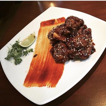 Seasons 52 - Duck Wing Lollipops - New American Near Me - Orlando, Florida Seasons 52 - Duck Wing Lollipops - New American Near Me - Orlando, Florida