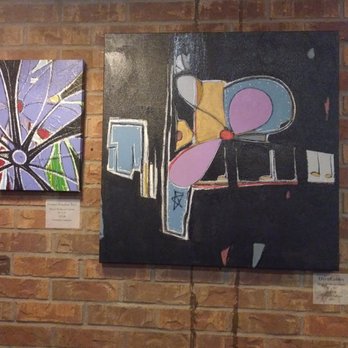 Slice Parlor - Wonderfully expressive artwork gives the parlor a nice, cozy feeling.  Artwork is for sale. - Pizza Near Me - Albuquerque, New Mexico
