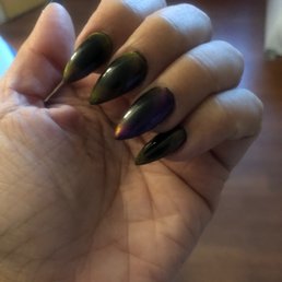 Cat eye on short stiletto nails. This photo does NOT do them justice. I get lots of compliments. Cat eye on short stiletto nails. This photo does NOT do them justice. I get lots of compliments.