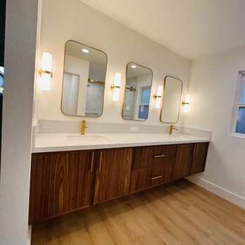 RISE Group - a bathroom with three sinks and three mirrors - Structural Engineers Near Me - Campbell, California RISE Group - a bathroom with three sinks and three mirrors - Structural Engineers Near Me - Campbell, California