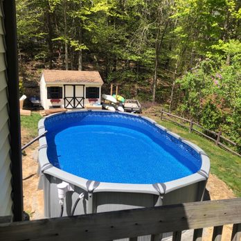 JP Pools - a view of a backyard pool - General Contractors Near Me - Plainville, Connecticut
