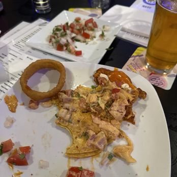 Lounge 51 - This is what the left on my taco the onion ring sorry I didn't take a picture before there was just too good. - Pizza Near Me - Tarzana, California