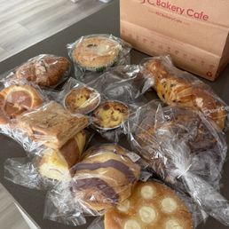 Chocolate croissant, egg tart, ube bread, coconut everything. I forgot the other's names.